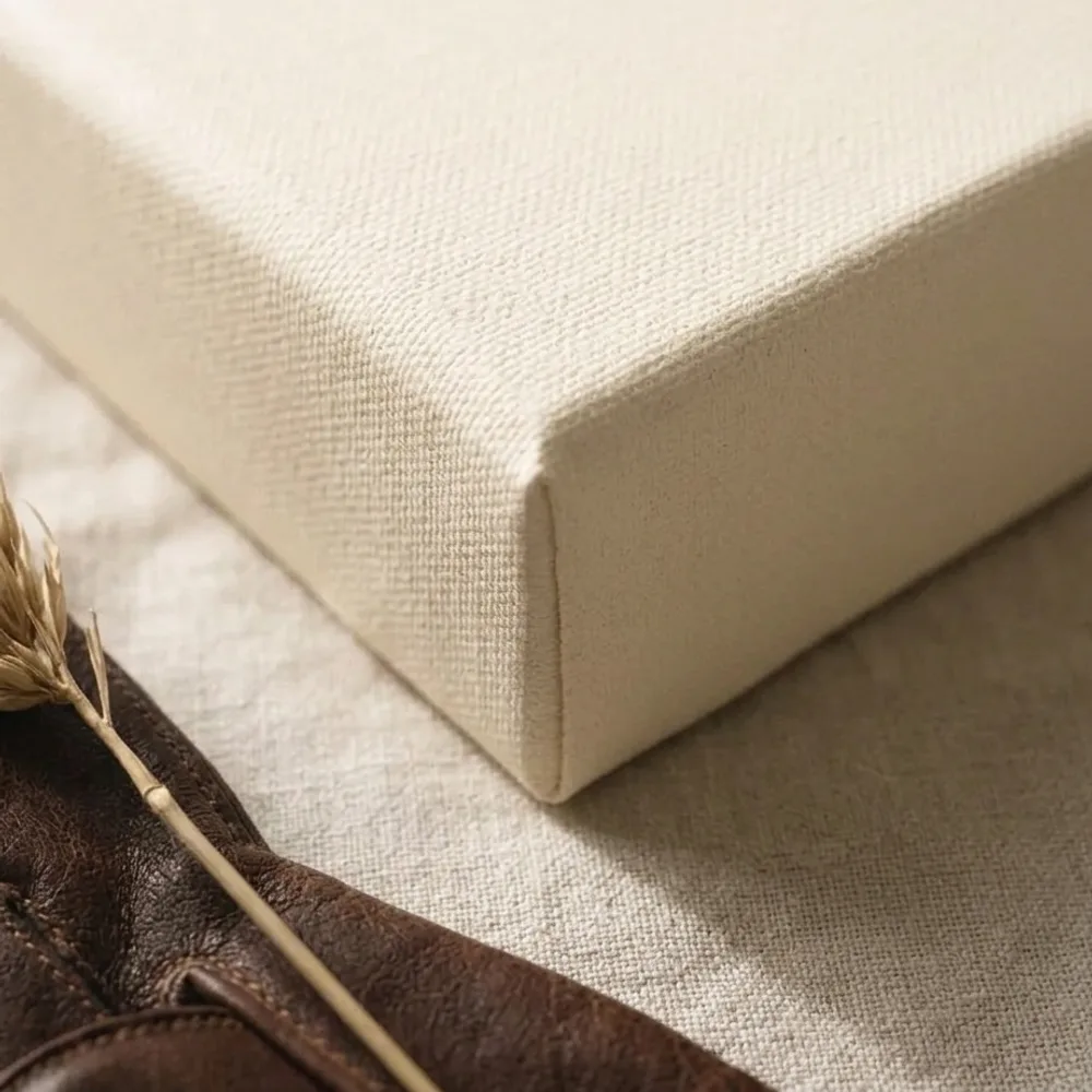 Corner of a gallery-wrapped canvas print showing texture and deep wrap
